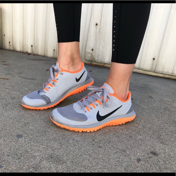 grey orange nike shoes